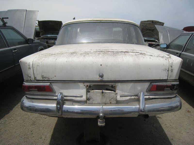 Illustration for article titled Happy Tailfins And All, This 1965 Mercedes-Benz 190c Is Crusher-Bound